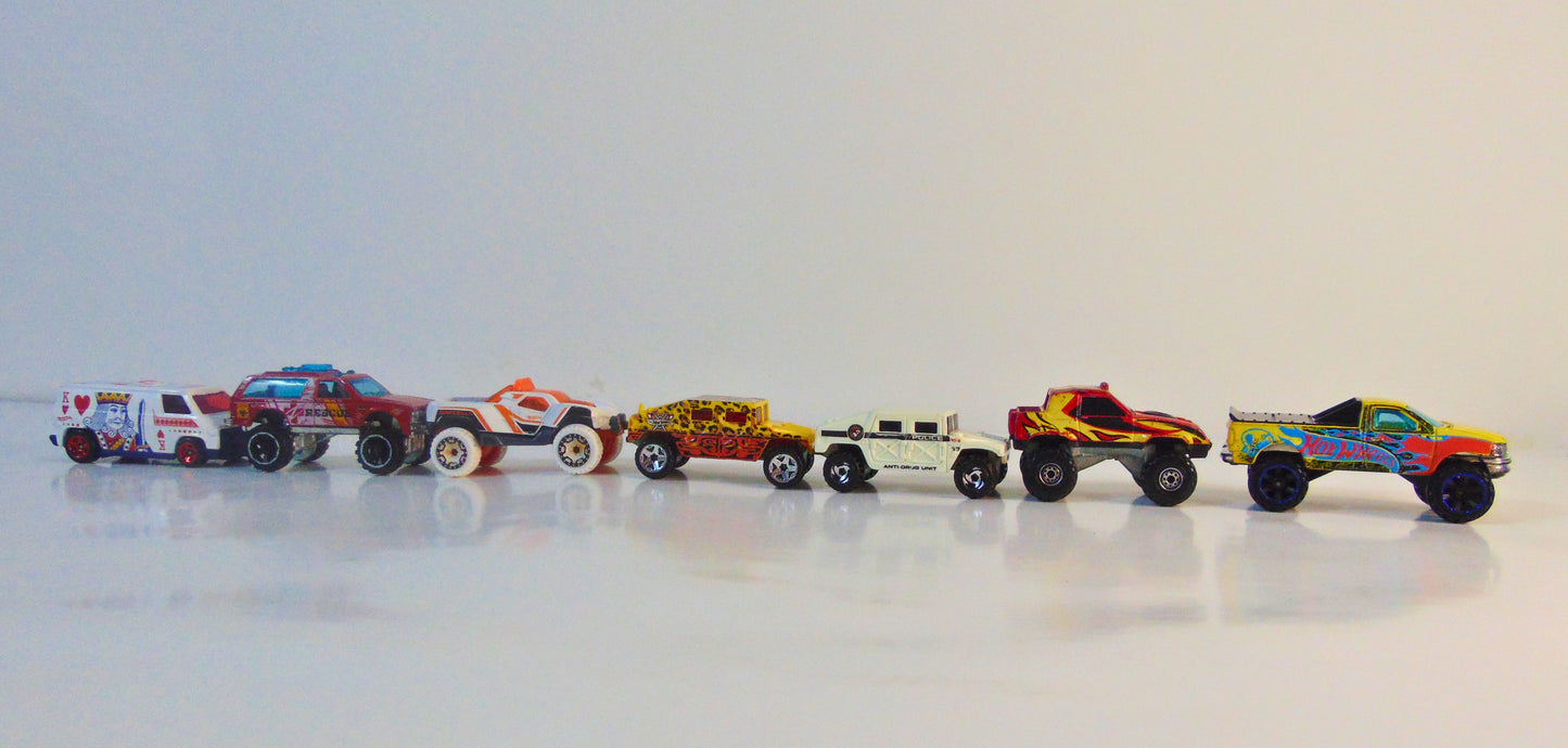 Pack of 7 Four-Wheeler Trucks - Hot Wheels Original Metal Cars